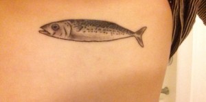 Zoe Prekop's '15 fish tattoo on her ribcage.