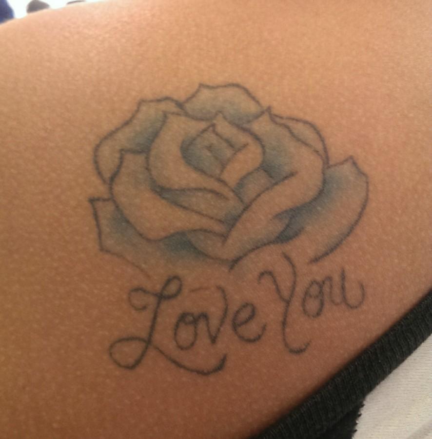 Jennifer Moran's '15 tattoo on her shoulder.