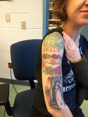 Art Teacher Laura Boban's tattoos on her arm.