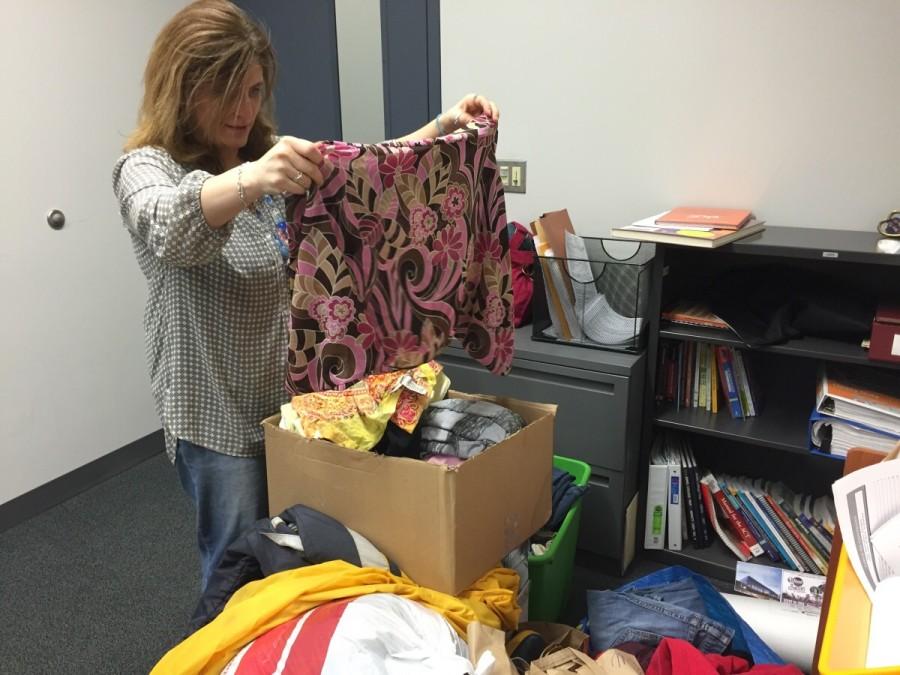 Melynda Kroeger has begun the sorting process of the items to be sold at the new thrift shop.