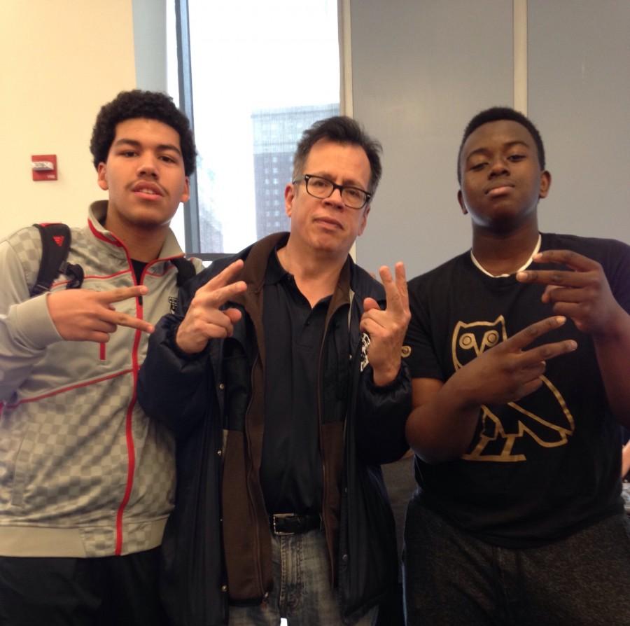 Gonzalez with two of the students he mentors, Jesse Gomez 16 & Malakye Hall 16