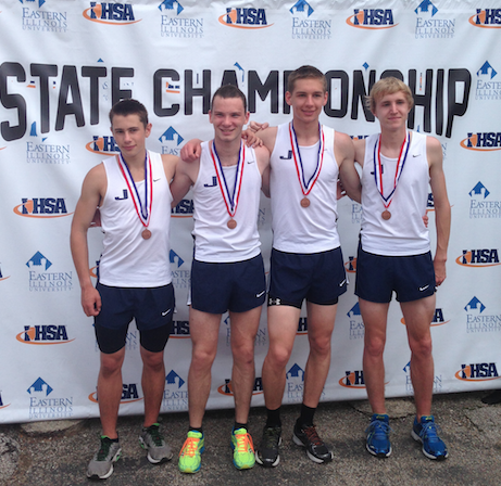 The four runners with their medals.