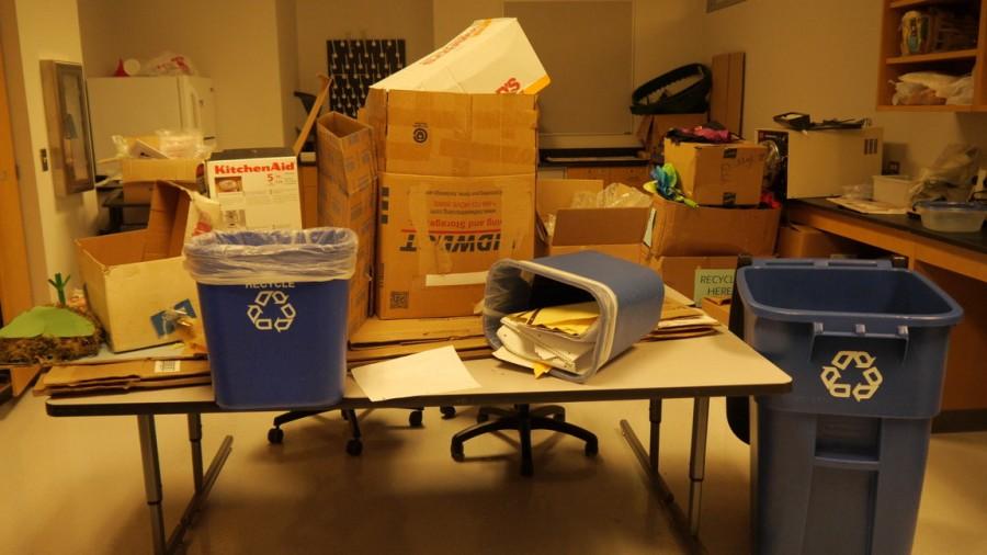 The Green Team's headquarters is packed with recyclables and bins. 