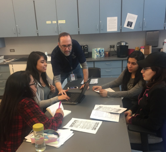 Dreamers Club Members Cristal Martinez ‘17, Ivonne Jimenez ‘17, Teresa Vergara-Miranda ‘17, Elena Brambila ‘17 and Librarian Francis Feeley in the middle of finalizing details for their workshops.