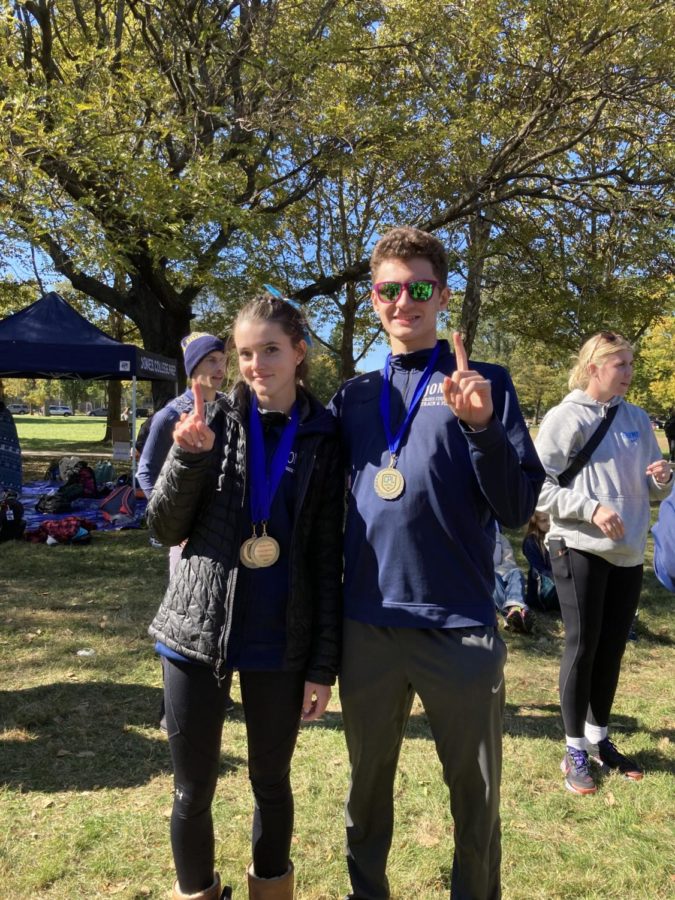 SUCCESS: Evelyn Hett ‘23 and Sam Berlinghof ‘24 after receiving individual first-place varsity medals.