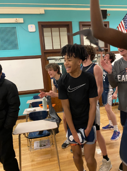 CHEESING: Ethan Samuels celebrates after game-winner vs. Lane Tech.