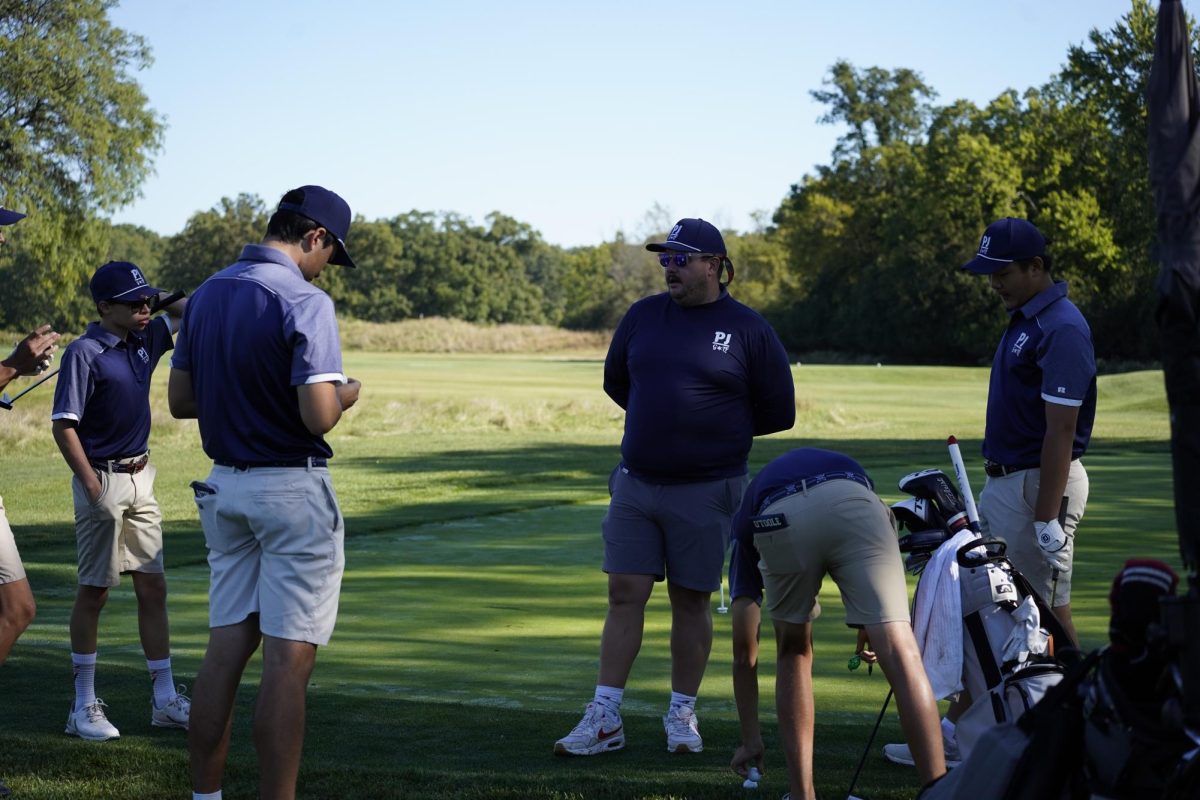 Coach David Gilmer and the Boys Golf team . Photo Credits: David Gilmer.				