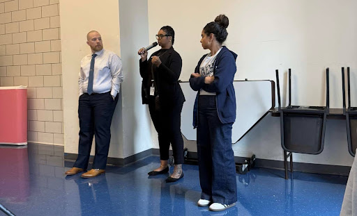 Assistant Principals McGuire, Jordan, and Ofori talking to students at a forum held by SGA.