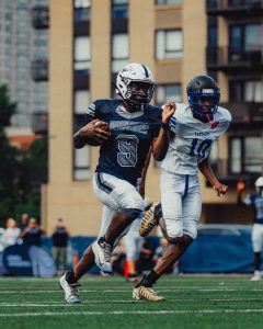 Senior Shawn Slaughter rushing to the end zone in a 20-8 victory.