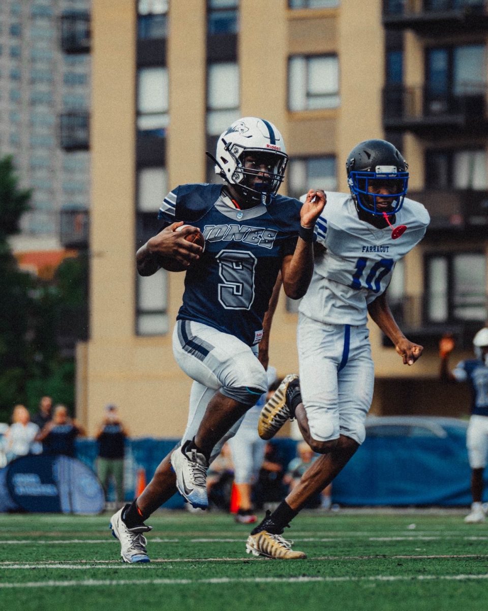 Senior Shawn Slaughter rushing to the end zone in a 20-8 victory.