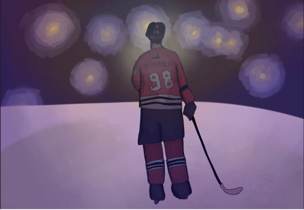 Blackhawks forward Connor Bedard looking up at the lights.
