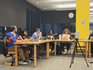 Principal Kerry Dolan talks to LSC representatives about the Homecoming contract at Soldier Field. A special LSC meeting was held on Sept. 30 to approve the contract.