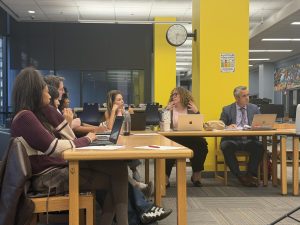 Principal Kerry Dolan talks to LSC representatives, students and teachers in attendance about financing the Homecoming dance at Soldier field. The council voted 8-2 to approve a contract with Soldier Field.
