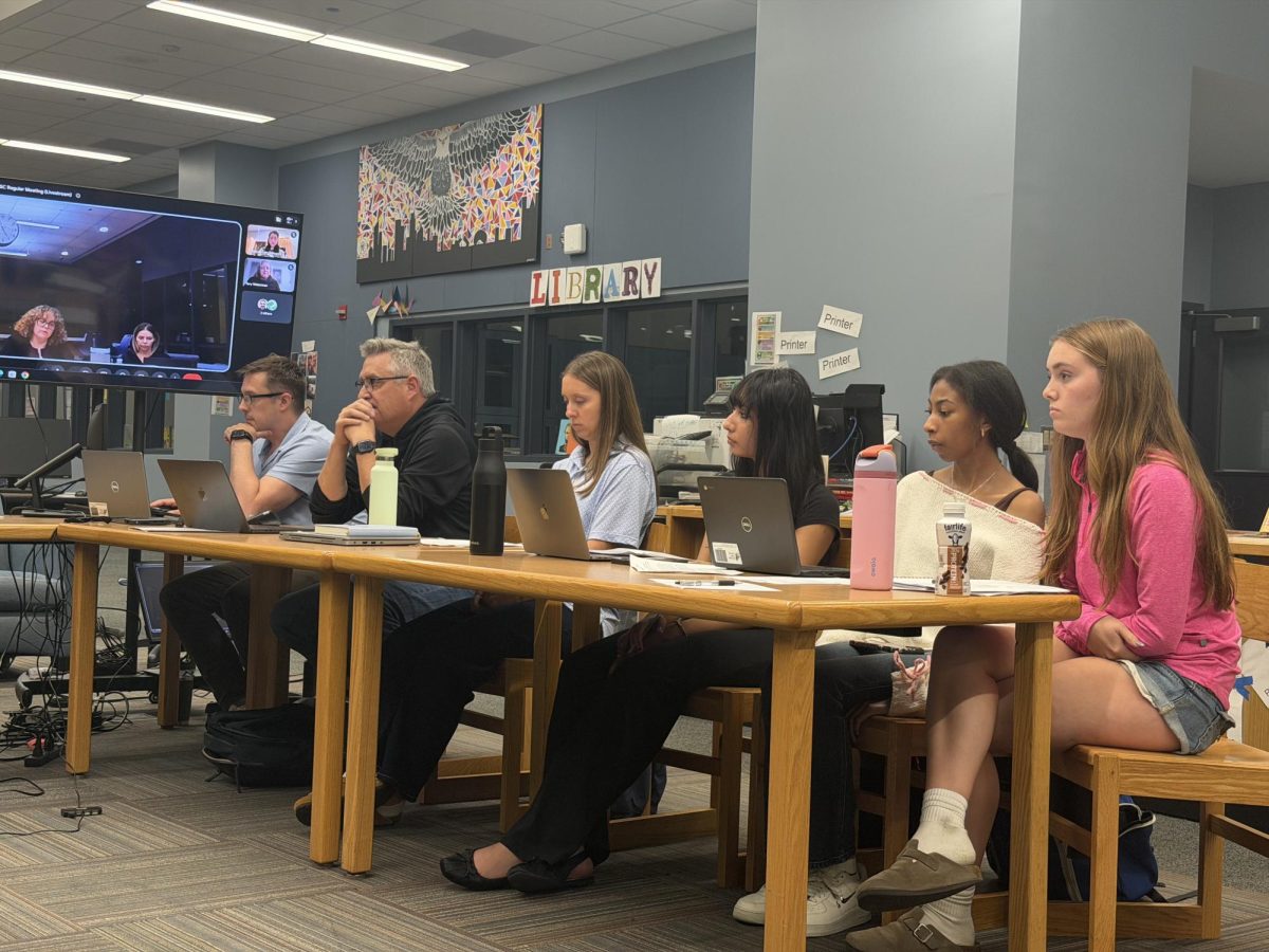 LSC representatives listen to Jones teachers as they raise concerns about the administration’s ability to communicate and build trust with faculty. The October regular LSC meeting was held in the library Wednesday night.