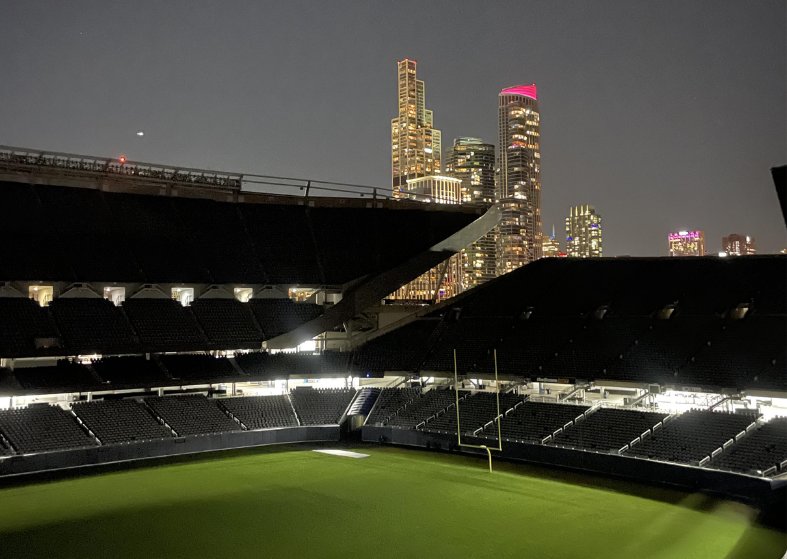 Lights illuminate soldier field as the Chicago skyline glows in the background on Homecoming night. Jones moved the Homecoming dance from Jones to Soldier Field this year.