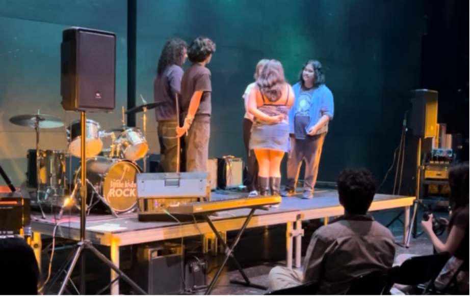 Students performing at the Music Performance Club open mic located in the South Auditorium on May 26. Students are offered an opportunity to connect and bond over music through after school clubs.